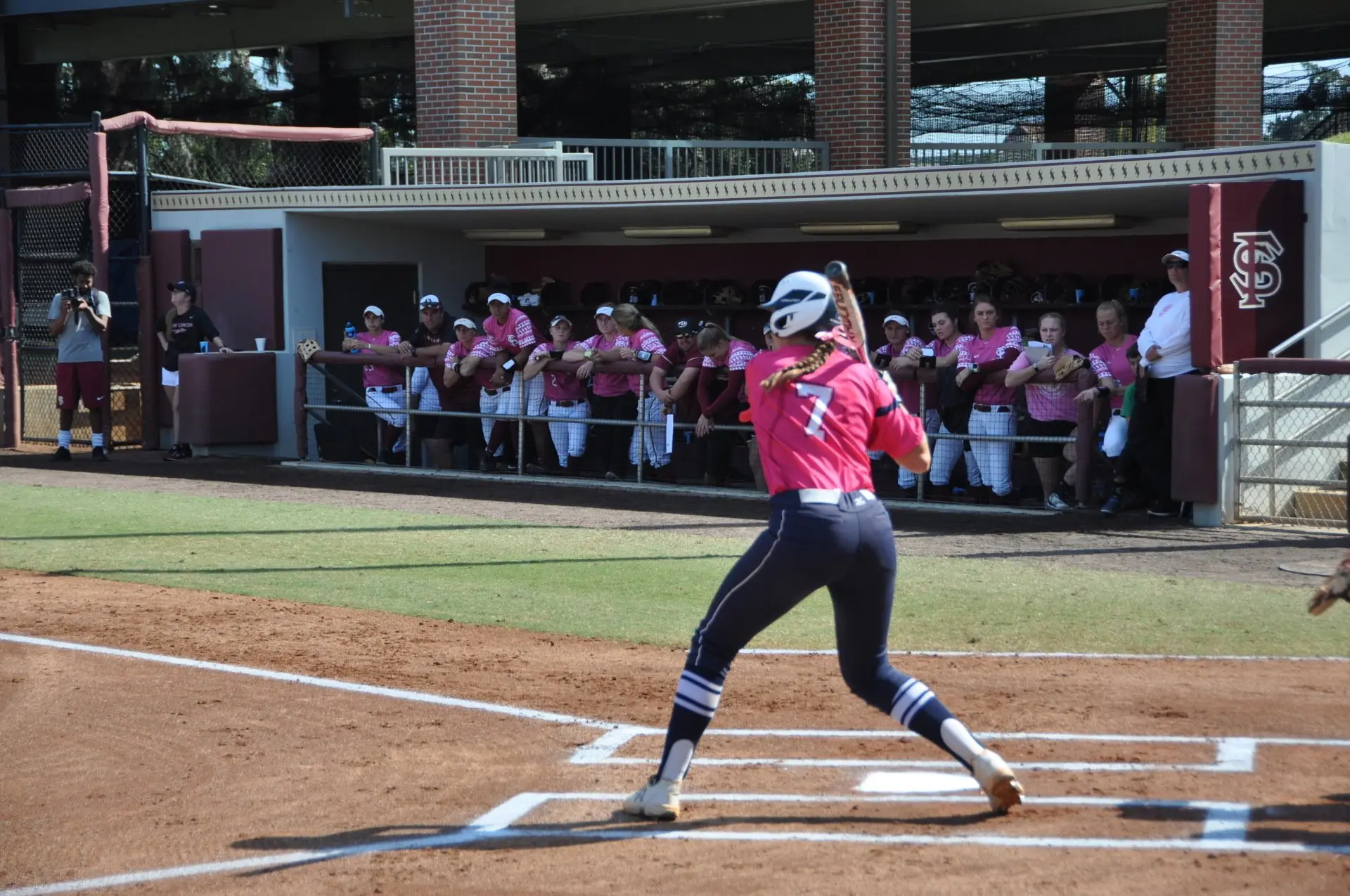 Danielle de Ruiter, number 7, striding into a swing against LSU